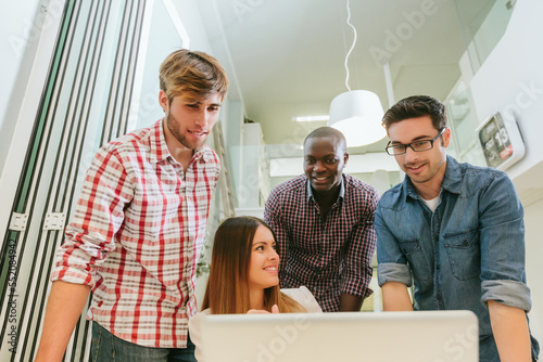 Young Entrepreneurs Working at the Office photo