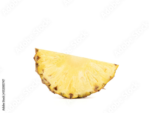 Pineapple slice in the form of a semicircle isolated on a white background.