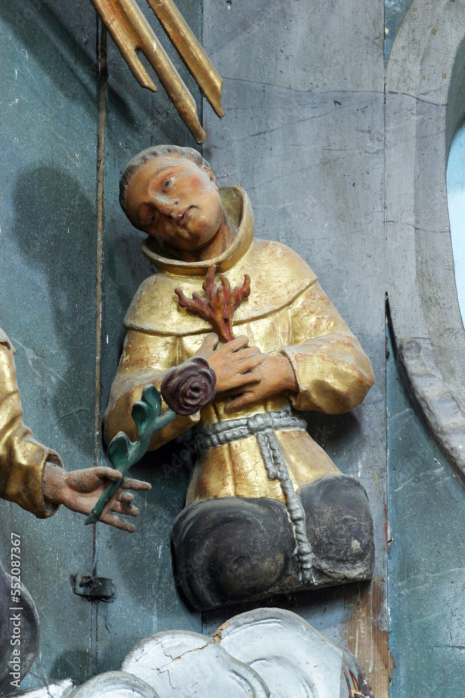Naklejka premium Statue of Saint on the altar of Fourteen holy helpers in the church of St. Catherine of Alexandria in Krapina, Croatia