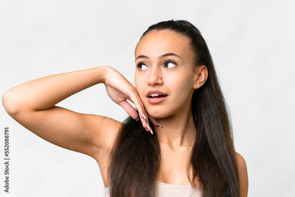 Portrait of pretty young Arabian woman over isolated background Portrait of pretty young Arabian woman over isolated background