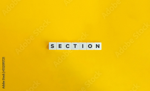 Section Word on Block Letter Tiles on Yellow Background. Minimal Aesthetics.