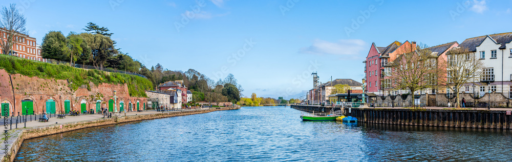 Obraz premium Exeter, Devon, England, UK - April 2022: Quayside landscape on river Exe waterfront