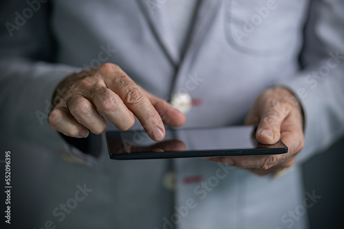 businessman using digital tablet