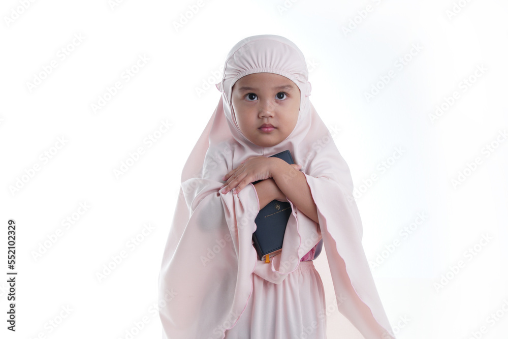 Pretty Muslim Hugging Loves Holy Book of Quran Isolated on White Background Pretty Muslim Hugging Loves Holy Book of Quran Isolated on White Background