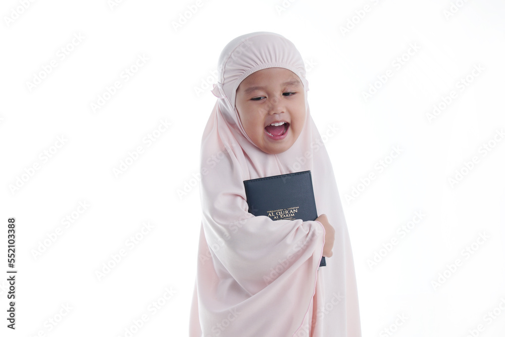 Pretty Muslim Hugging Loves Holy Book of Quran Isolated on White Background Pretty Muslim Hugging Loves Holy Book of Quran Isolated on White Background