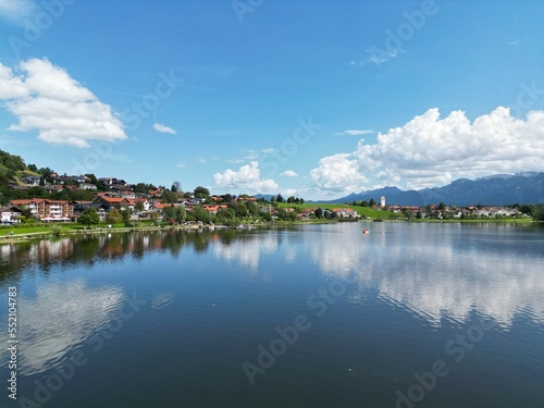 Hopfensee lake and town Hopenfen Swabia Bavaria Germany drone aerial view