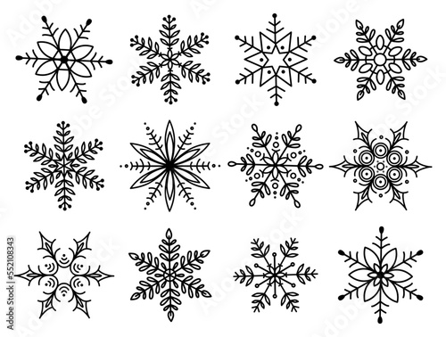 Set of black silhouettes of openwork snowflakes. Vector Christmas illustration.