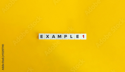 Example 1 (One) Text on Block Letter Tiles on Yellow Background. Minimal Aesthetics.