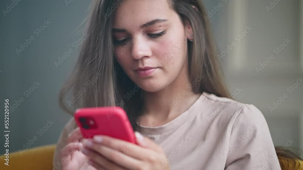Girl surfing social media site on the phone Girl surfing social media site on the phone