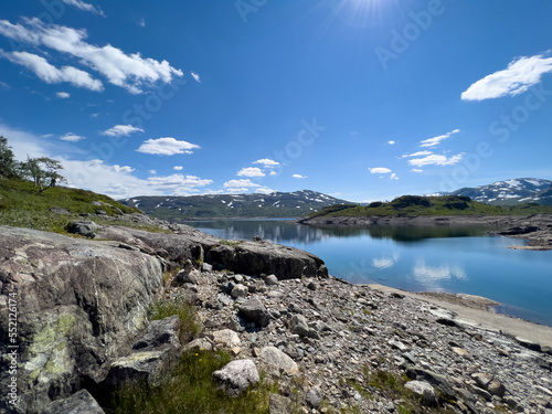 lake in norwegian mountains on a sunny day