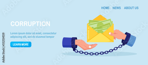 Businessmen hands in handcuffs with envelope full of money. Hidden wages, black payments, tax evasion. Anti corruption concept. Financial crimes. Man giving bribe to politician. Illegal activities