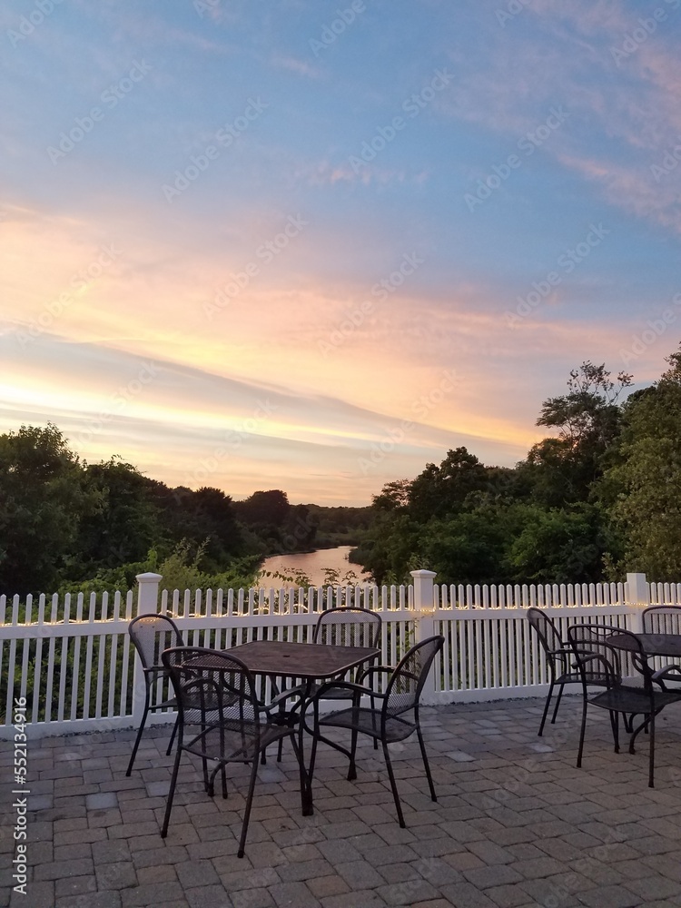 Fototapeta premium Setting for Dining al Fresco with a sunset on the cape
