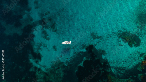 aerial imagery 4k of land and sea with boats © ruben