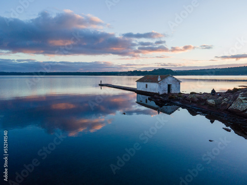 4k aerial views of a small jetty.