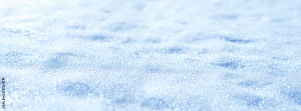 Abstract natural winter snow background. blue-white beautiful snowflakes surface macro shot. winter season. Texture for design. selective focus. banner