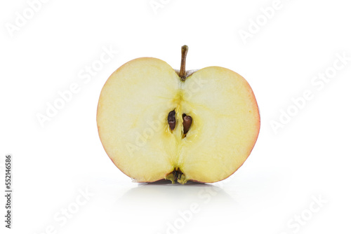 Half fresh organic apple with fruit pulp, seeds and stem, isolated with shadow on a white background, copy space