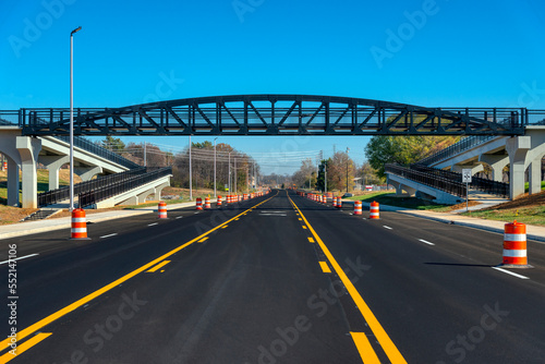Fotomurale Freshly Paved Road Under New Pedestrian Bridge