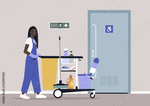 A young character in overall uniform rolling a janitor cleaning service cart down the hall