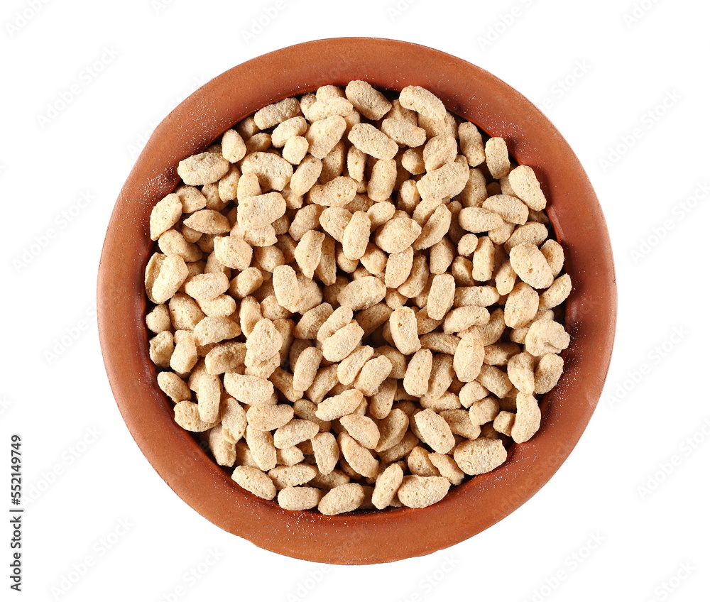 Extruded crunchy oat flakes, pile in clay pot, isolated on white, top view Extruded crunchy oat flakes, pile in clay pot, isolated on white, top view