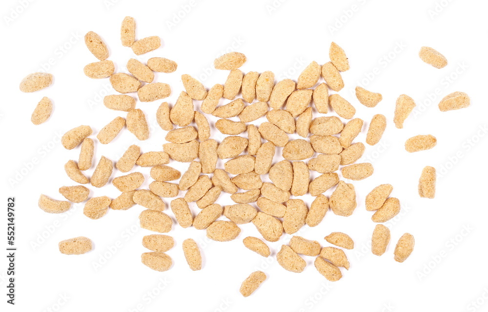 Extruded crunchy oat flakes, pile isolated on white, top view Extruded crunchy oat flakes, pile isolated on white, top view