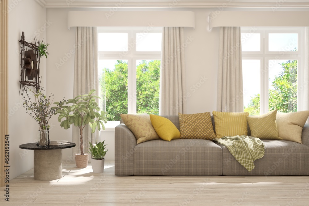 Fototapeta premium Minimalist living room in white color with sofa and summer landscape in window. Scandinavian interior design. 3D illustration