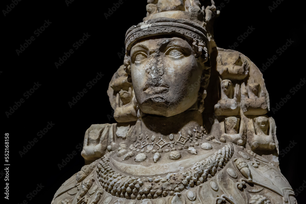 Great Artemis marble statue in Ephesus. Close up fragment, selected focus, black background. History and art concept. Selcuk, Turkey (Turkiye).