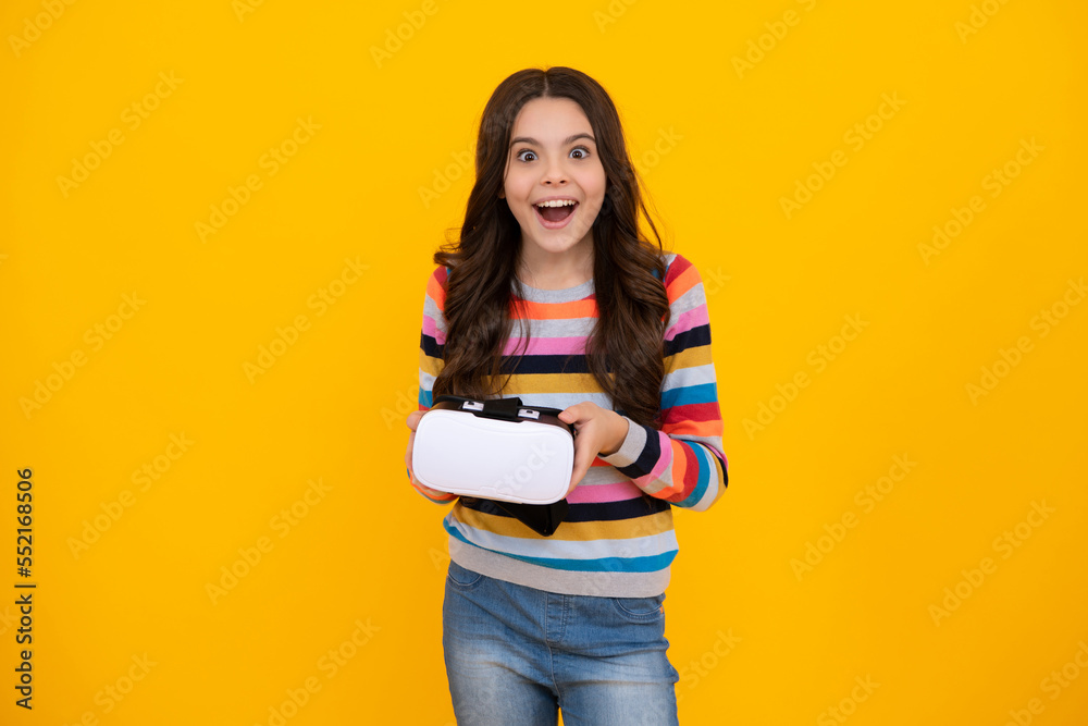 Virtual gadgets for child, free time and study. Teen school girl uses vr glasses, isolated on yellow background, studio shot. Happy teenager, positive and smiling emotions of teen girl. Virtual gadgets for child, free time and study. Teen school girl uses vr glasses, isolated on yellow background, studio shot. Happy teenager, positive and smiling emotions of teen girl.