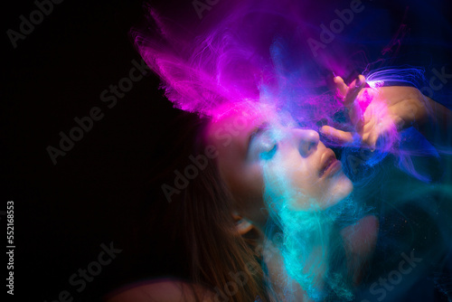 Abstract photography in the style of light painting. girl on a black background © SergeyKatyshkin