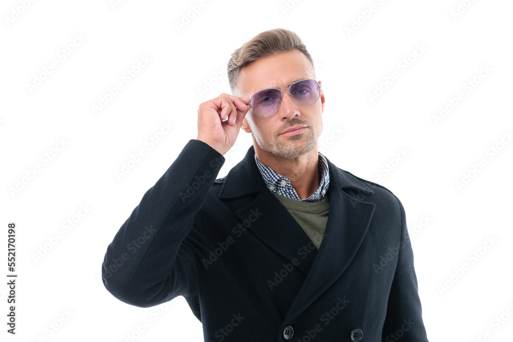 face of mature man in coat and glasses menswear. studio shot of mature man wear menswear. face of mature man in coat and glasses menswear. studio shot of mature man wear menswear.