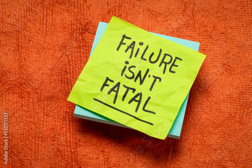 failure is not fatal - inspirational reminder note, learning, experience and personal development concept photo