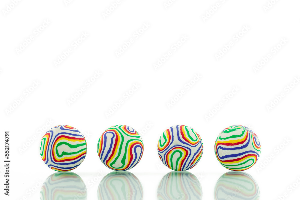 Colorful Jacks Balls on white background