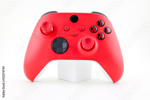 Close-up of a video game controller, focus on buttons. Isolated on white background.