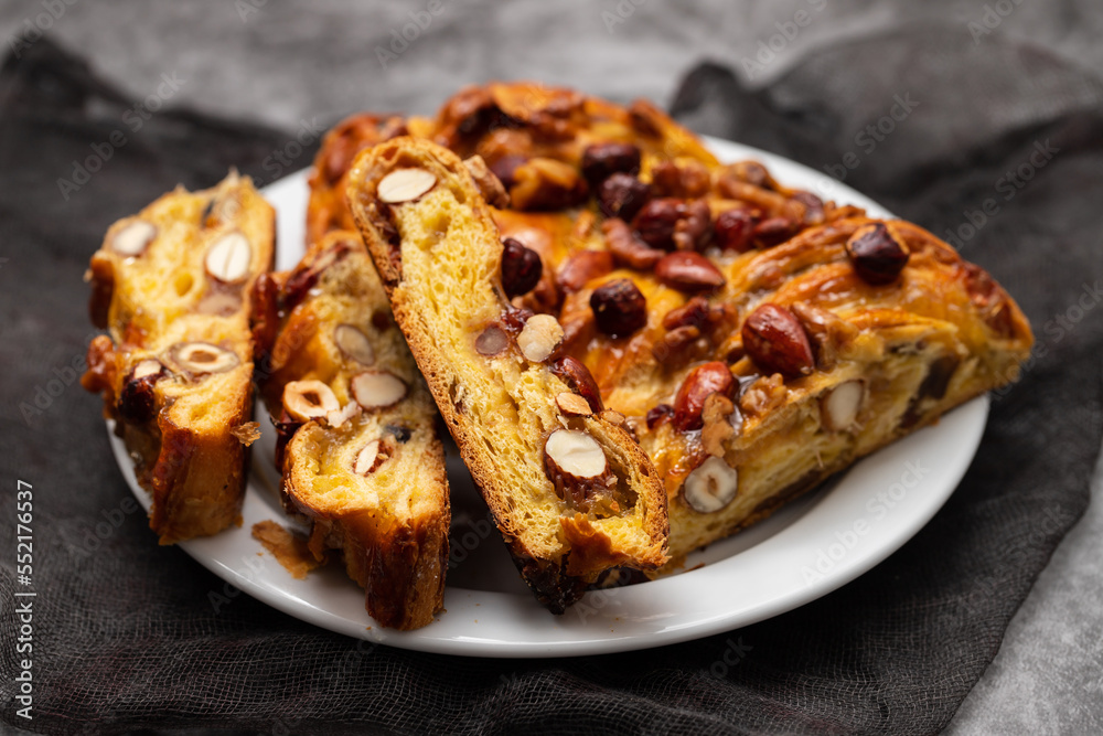 typical portuguese fruit cake Bolo rainha on plate typical portuguese fruit cake Bolo rainha on plate