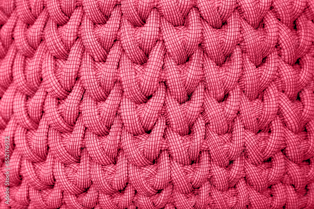 super chunky knitted background. Knitted structure. viva magenta super chunky knitted background. Knitted structure. viva magenta