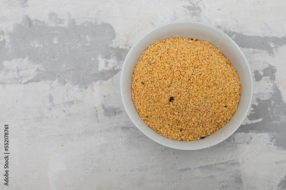 Farofa, typical brazilian manioc flour side dish on ceramic Farofa, typical brazilian manioc flour side dish on ceramic