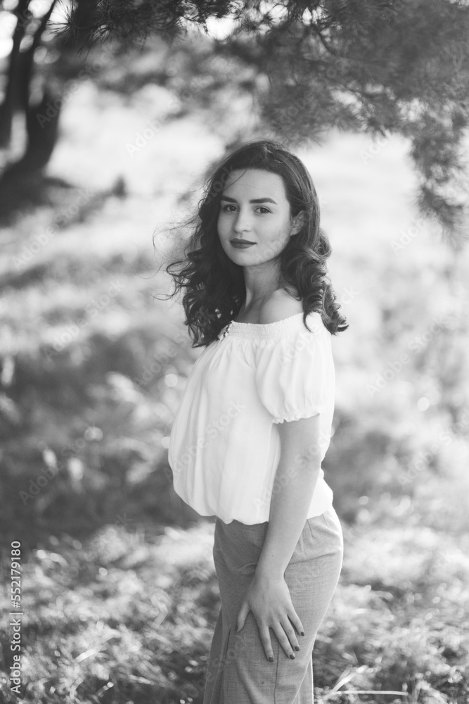 Young woman walking in forest Young woman walking in forest