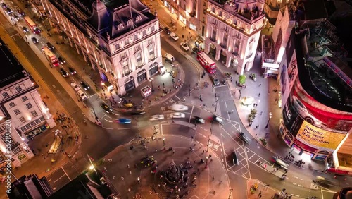 Establishing Aerial Top Down Timelapse of London UK Piccadilly Circus Regent Street and Leicester Square at Traffic Hour Cars And Double-Decker Bus Driving  photo