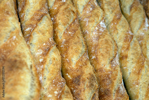 Stack of crispy baguettes at the bakery