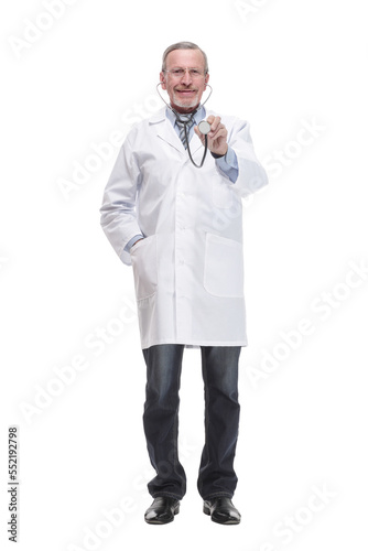 Thoughtful doctor wearing glasses examining X-ray image