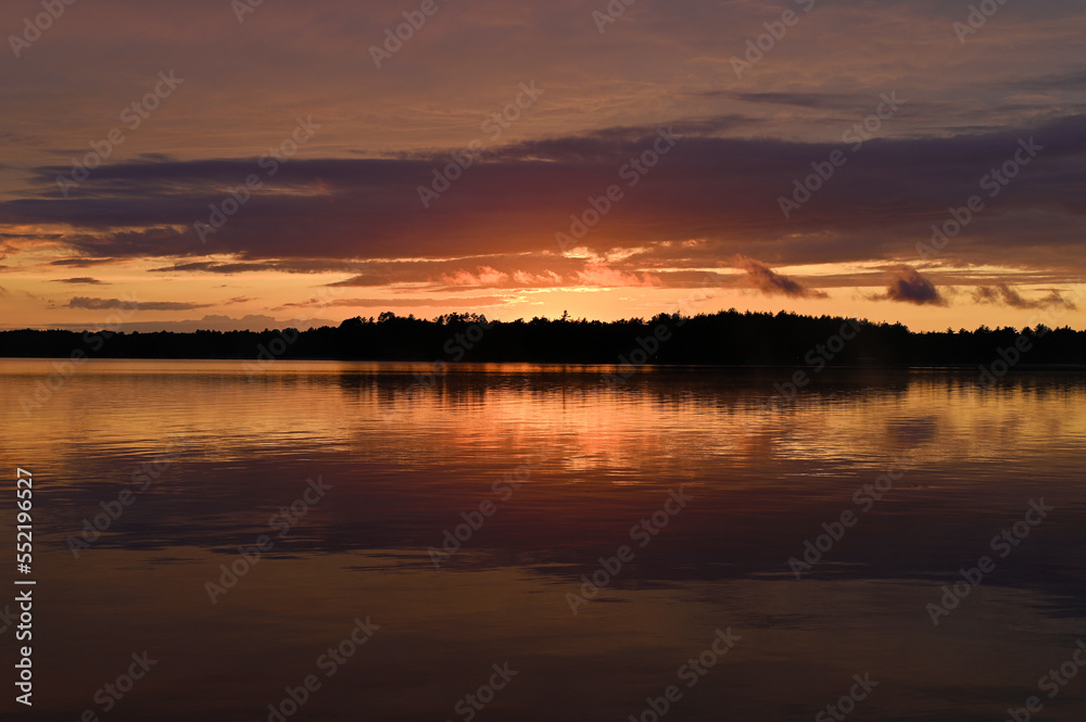 Red sky reflected in a lake at dusk 1