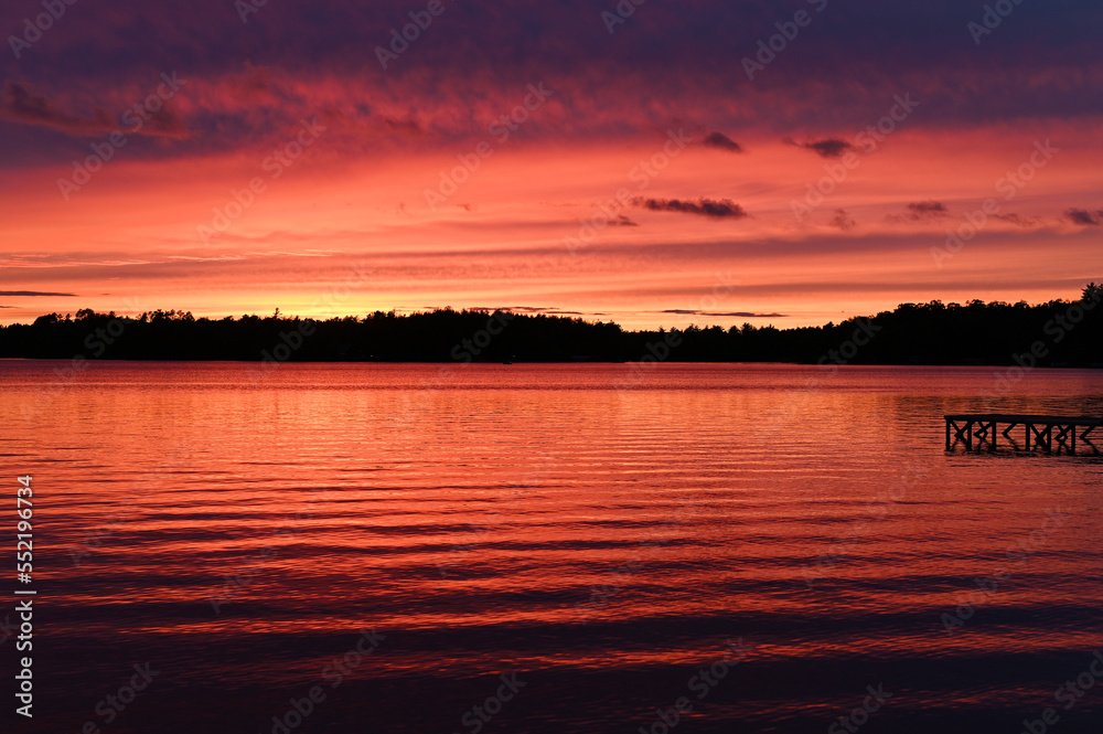 Dusk on a lake with evening clouds 2