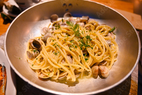 Spaghetti and shells served in Italian restaurant. Shell pasta. 
