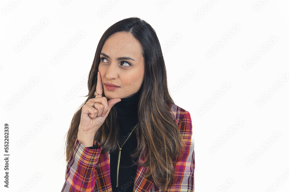 brunette girl pondering over something, medium closeup isolated studio shot. High quality photo brunette girl pondering over something, medium closeup isolated studio shot. High quality photo