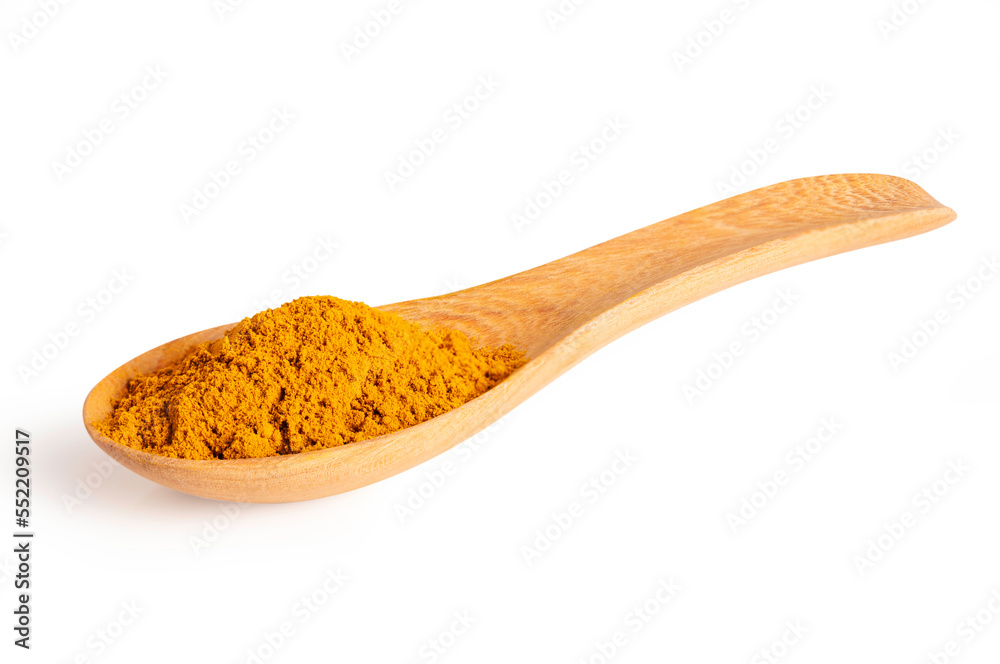 Turmeric powder in wooden spoon on white background. Turmeric powder in wooden spoon on white background.