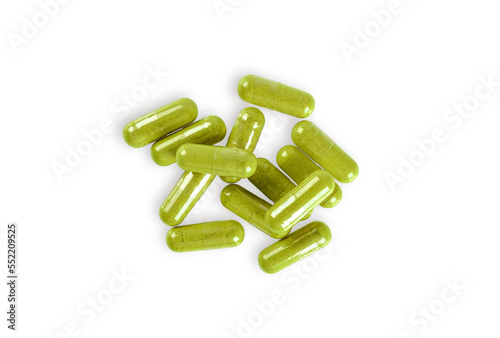 Herbal capsule isolated on white background.