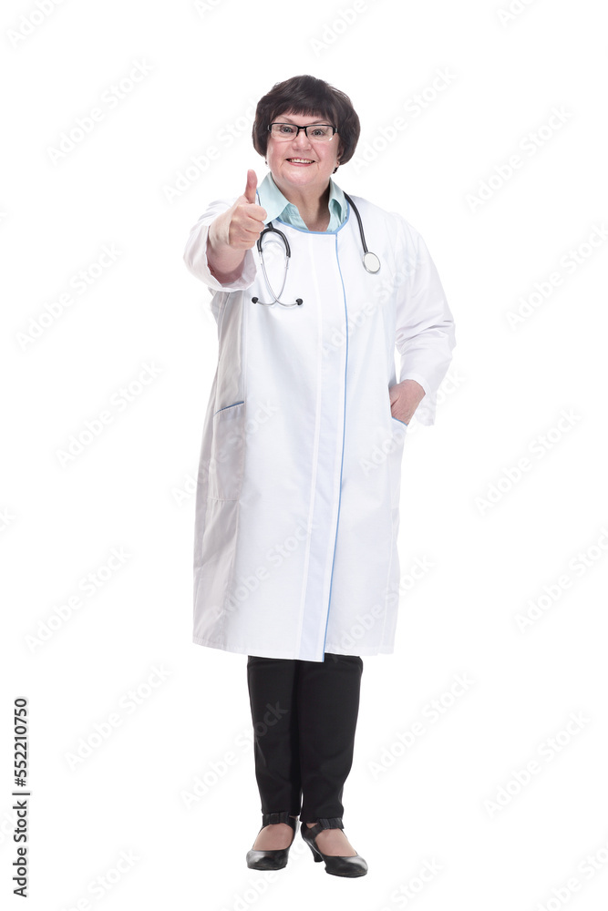 in full growth. senior female doctor with a stethoscope. in full growth. senior female doctor with a stethoscope.