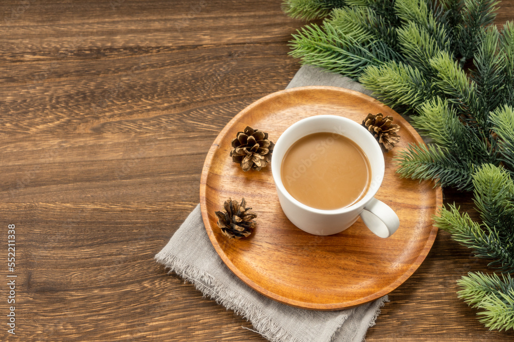 Obraz premium Christmas decorations and coffee on wooden background. christmas concept.