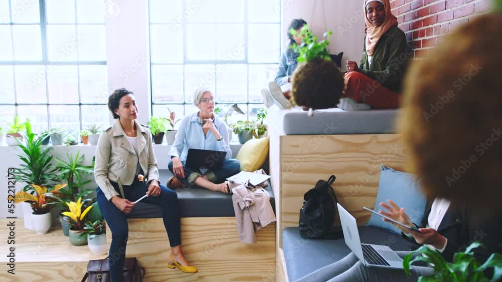 Creative startup, small business team and technology in coworking workplace with women talking, discussion and planning ux web design strategy. Diversity, green space and female tablet presentation