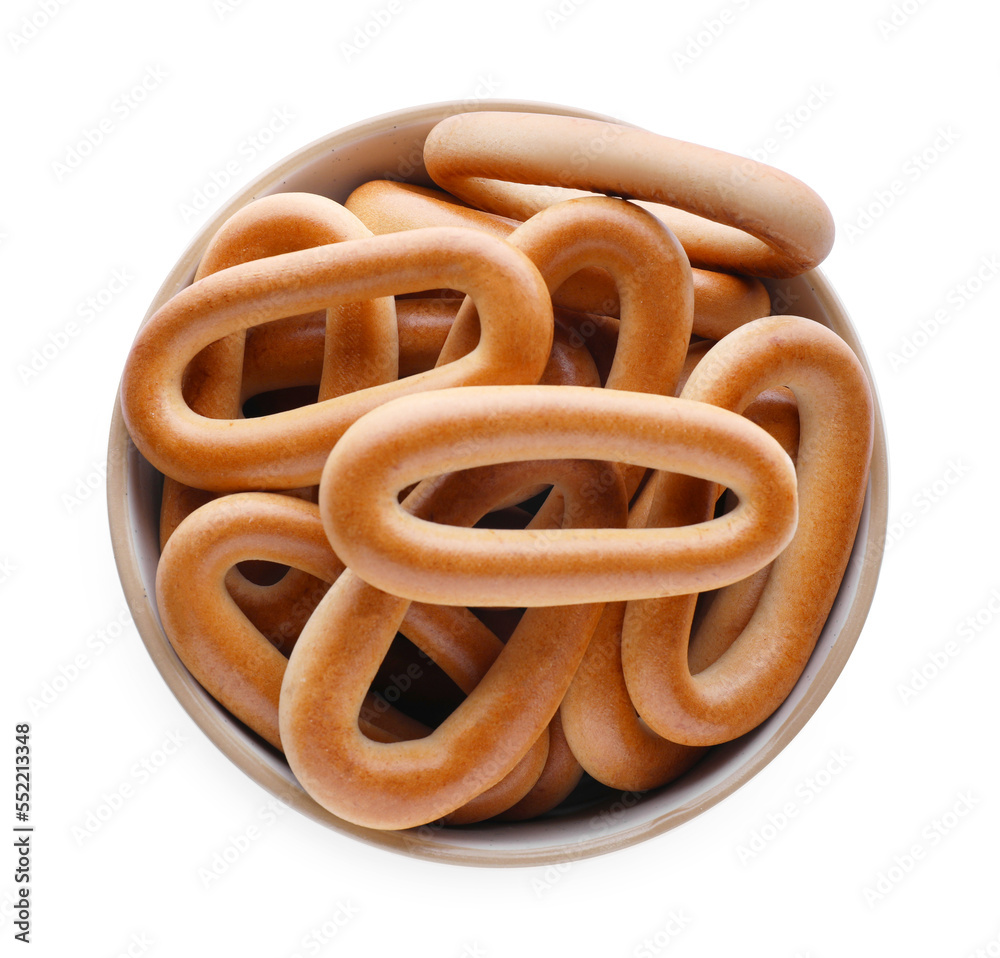Fototapeta premium Bowl with tasty dry bagels (sushki) isolated on white, top view