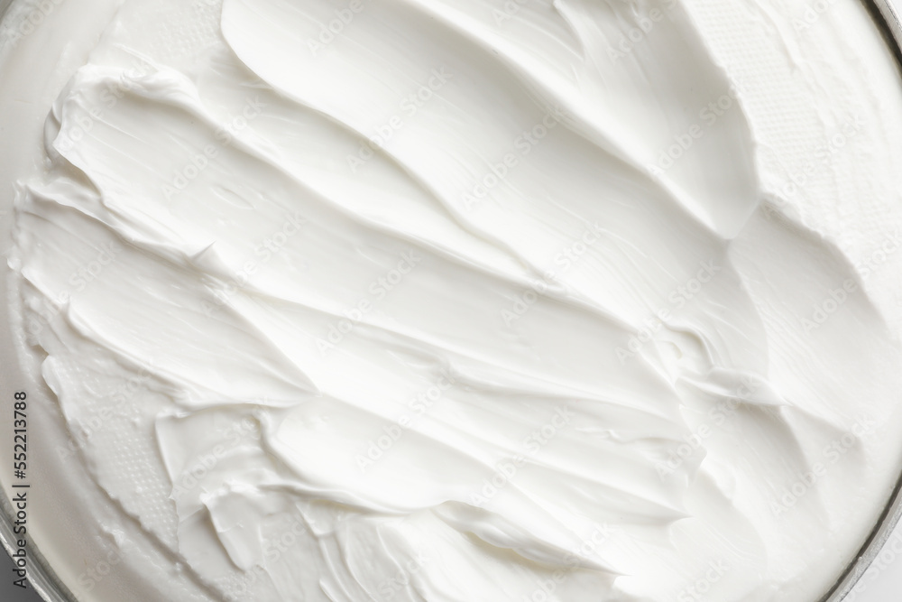 Texture of white facial cream, top view